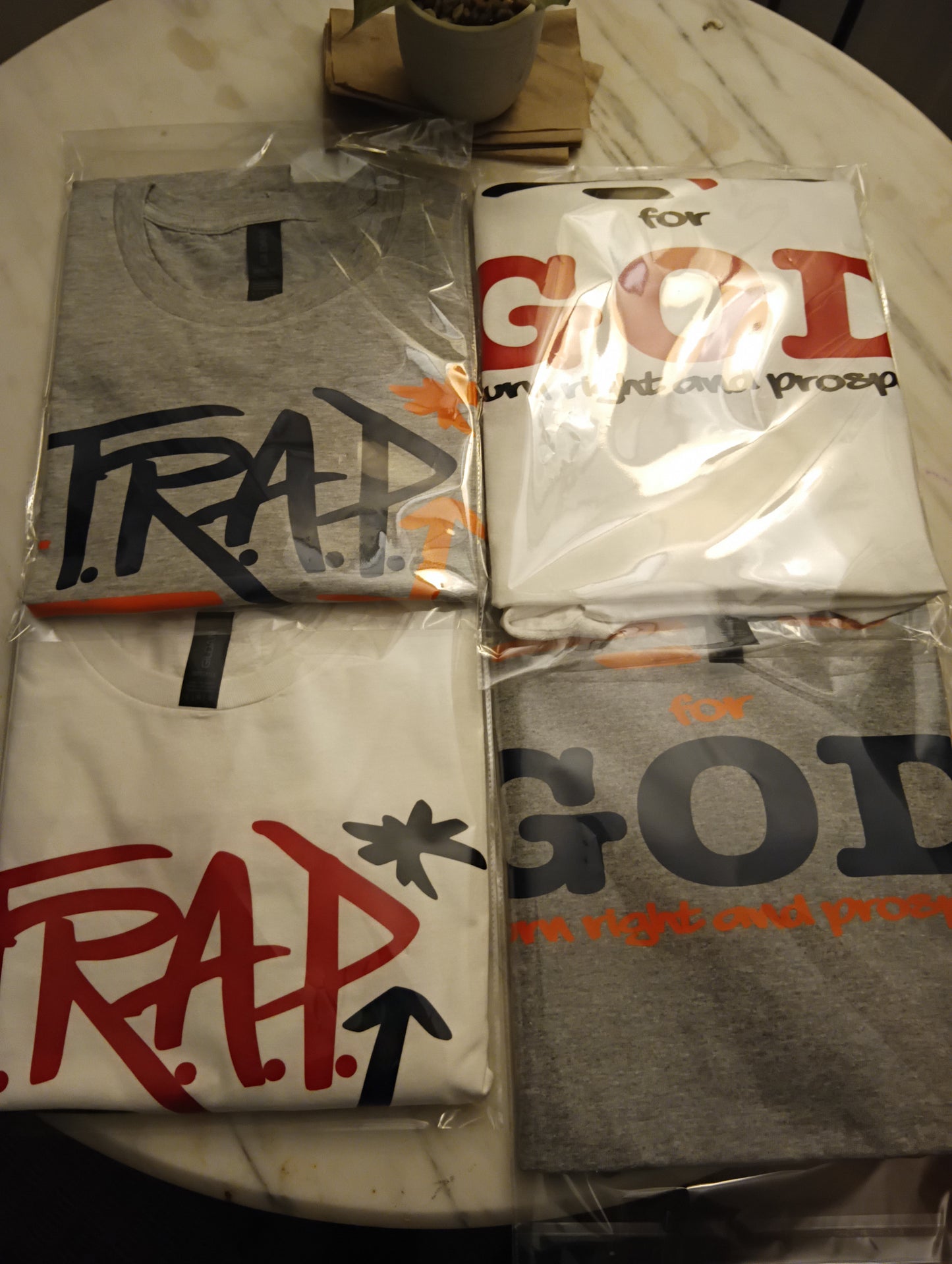 Theoplas Trap For God T-Shirts