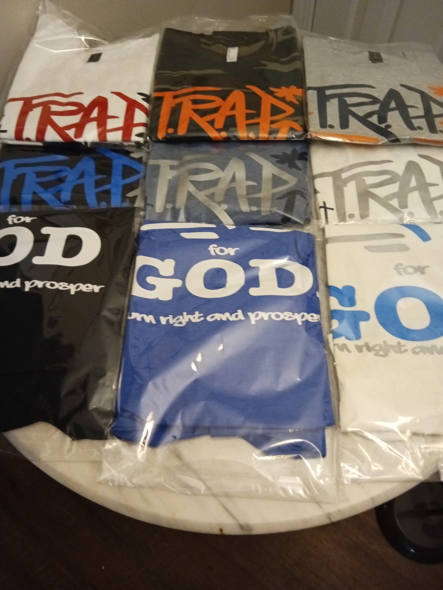 Theoplas Trap For God T-Shirts